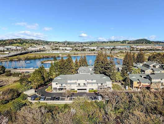 aerial view of apartments and lake