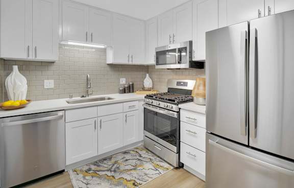 A modern kitchen with stainless steel appliances at Verandas Apartments, California, 91791