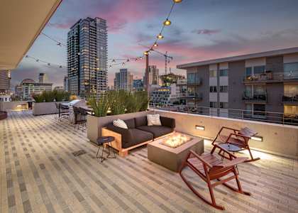 Rooftop patio at night at Idea1 Apartments in San Diego CA