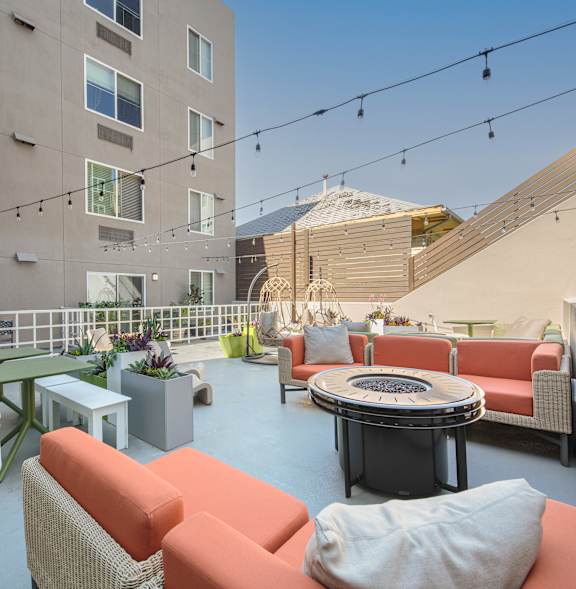 Axis Admiral's Hills Courtyard with a Stunning View of the Community Also Featuring Outdoor Fireplace