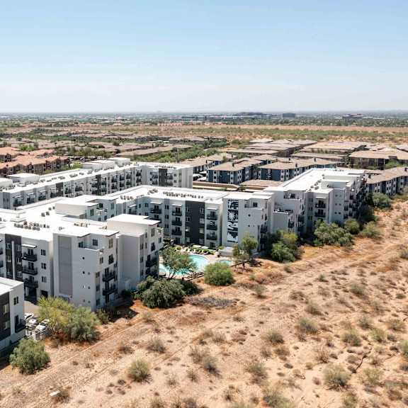A large housing complex in a desert.