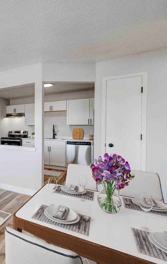A modern living room with tv at The Hampton Meadows Apartments, Des Moines
