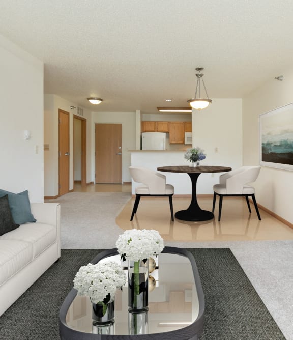 a living room with a couch and a table and a television