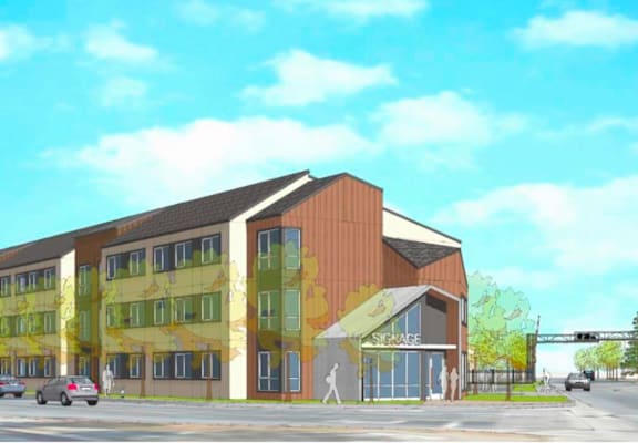 A modern building with a combination of brown and yellow panels.