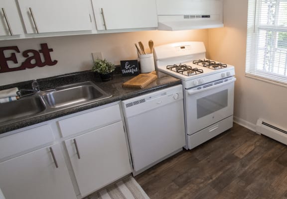 This is a photo of the kitchen in the 740 square foot 1 bedroom model apartmentat at Compton Lake Apartments in Mt. Healthy, OH.