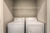 Thumbnail 65 of 78 - a washer and dryer in a laundry room  at EdgeWater at City Center, Kansas