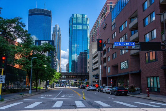 a city street with a traffic light and tall buildings