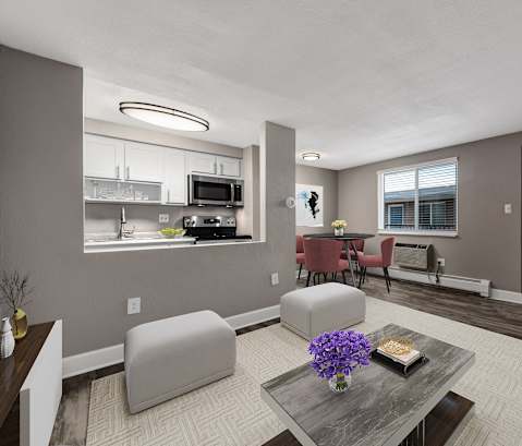 a living room with couches and a table