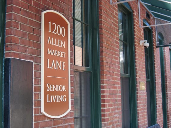 Allen Market Lane sign on the building, Allen Market Lane Apartments St. Louis, MO