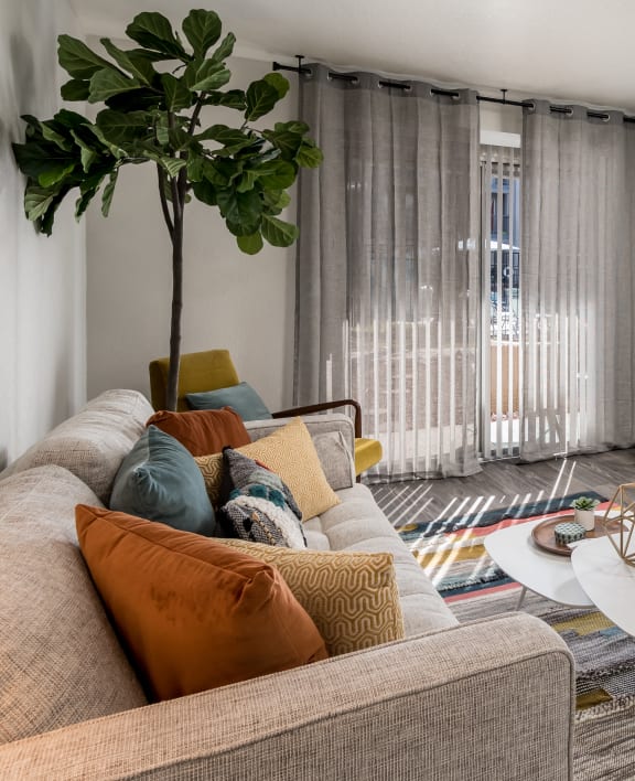 a living room with a couch and a coffee table