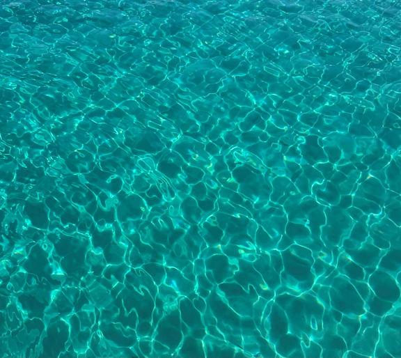 a view of the water in a swimming pool