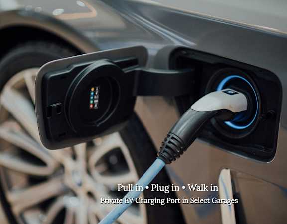 an electric car is plugged in to a plug in charger