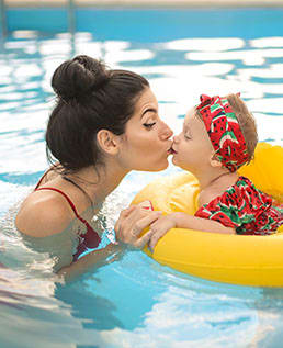 Mom and child in pool Doral Terrace in Doral Florida at Doral Terrace, Doral, 33178