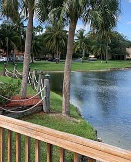 Small walking bridge by lake Cross Keys in North Lauderdale Florida