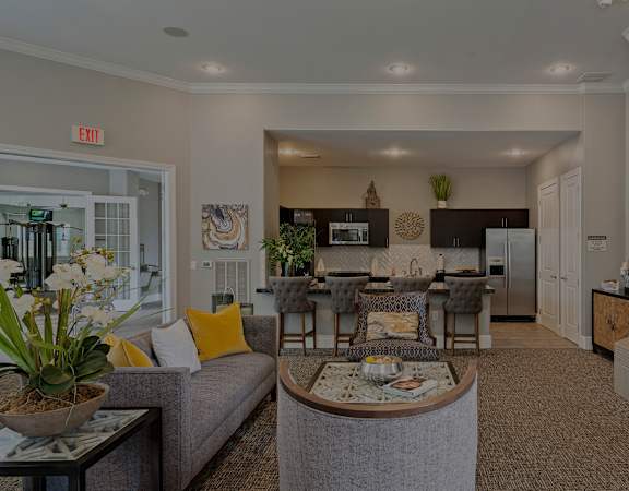 The Fairways at Corbin Park clubhouse with breakfast bar and couch