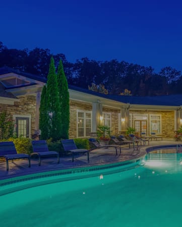 The Oaks at Johns Creek - Resort-style pool at dusk