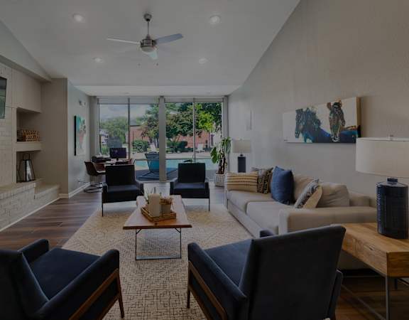 Clubhouse social area with fire place - East Chase Apartments