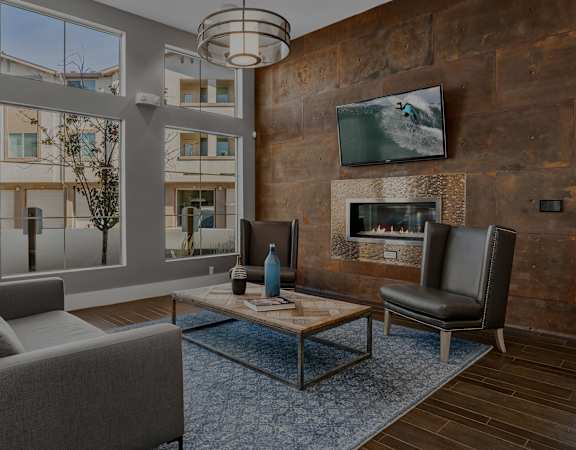 First and Main Apartments indoor fireplace lounge area