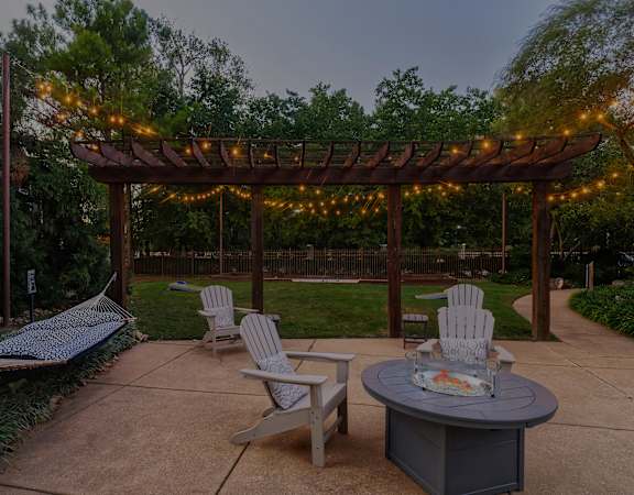 The Estates at River Pointe outdoor fire pit and hammock