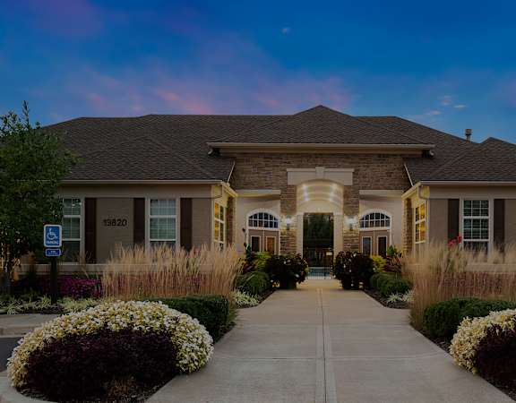 The Fairways at Corbin Park clubhouse entrance with landscaping