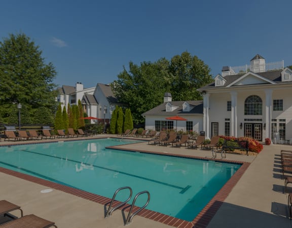 Swift Creek Commons Apartments resort-style pool with surrounding sundeck 