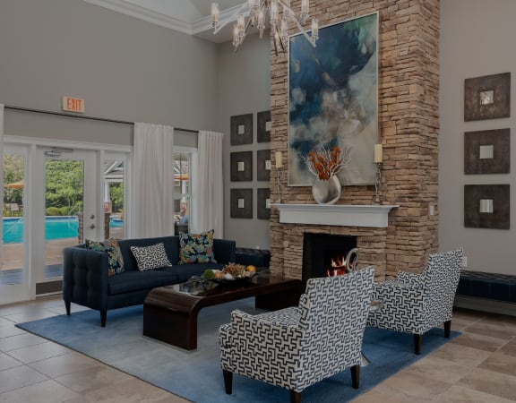 Carrington at Shoal Creek - Resident clubhouse social area with fire place