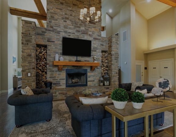 Clubhouse fireplace and social area - Glenbrook Apartment