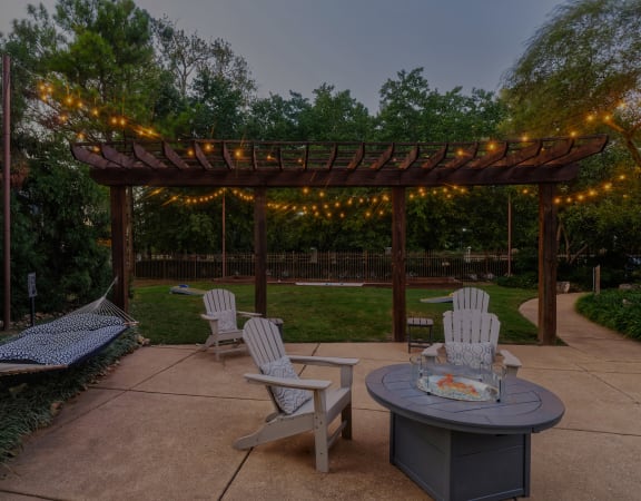 The Estates at River Pointe outdoor fire pit and hammock
