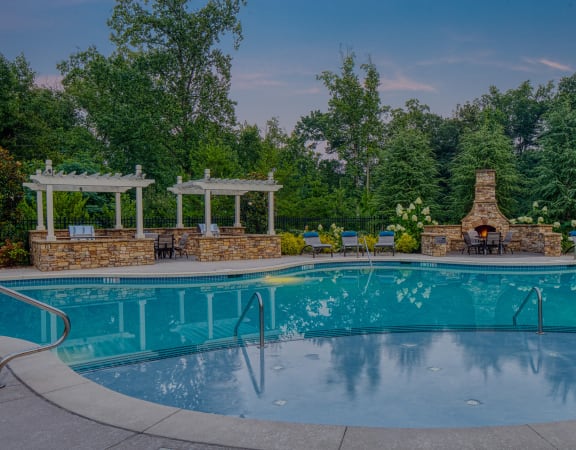The Oaks at Johns Creek - Poolside BBQ grills grills and outdoor fireplace
