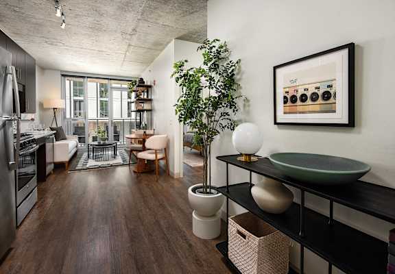 A modern kitchen with a view of the city.