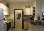 Thumbnail 13 of 28 - Interior Unit Kitchen Counter Stove Fridge Allegro Palms Riverview Florida