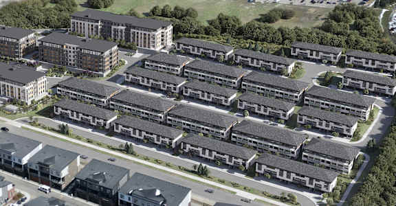 A bird's eye view of a residential area with multiple houses.