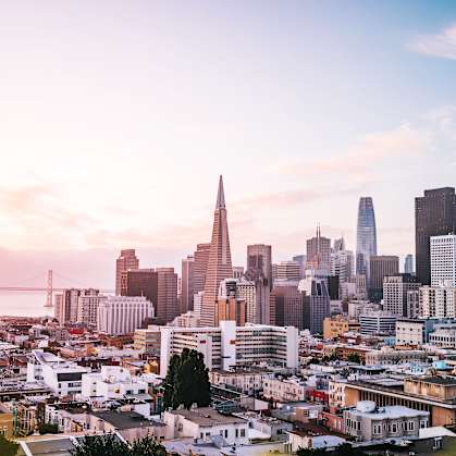 a view of the San Franciso skyline at sunset
