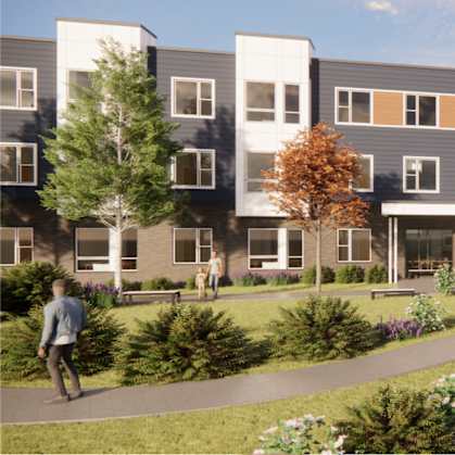 A modern apartment complex with a walkway in front.