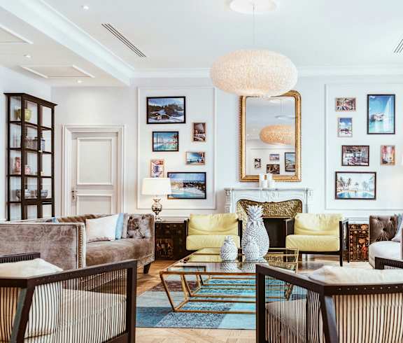 a living room filled with furniture and a fireplace