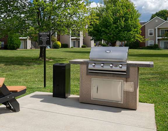 BBQ station with seating area - East Chase Apartments