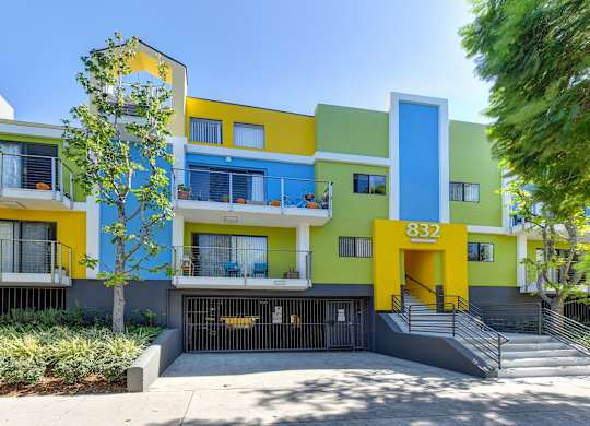 Community Entrance with Private Patios at Croft Plaza Apartments, West Hollywood California