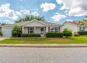 Thumbnail 1 of 8 - a white house on the side of the street at Huntington Village **, Warner Robins, GA, 31098