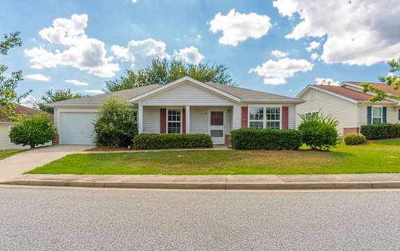 a white house on the side of the street at Huntington Village **, Warner Robins, GA, 31098