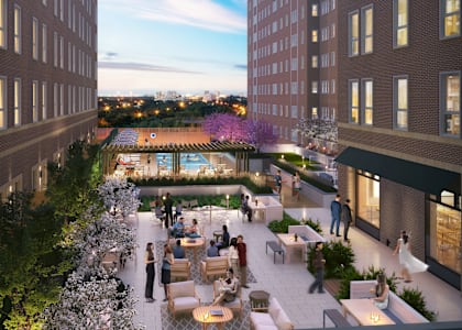 a rendering of a courtyard with seating and a pool