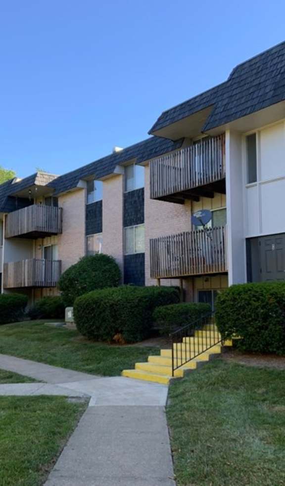 An apartment building with balconies.