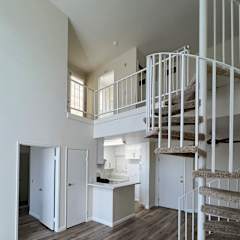 A room with a sliding glass door and a white door.
