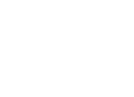 A black and white image of three trees with the words "RED ROCK MANOR" written below.