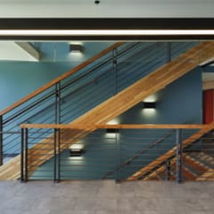 a wooden staircase with lights on the side of it