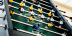 a foosball table in a game room