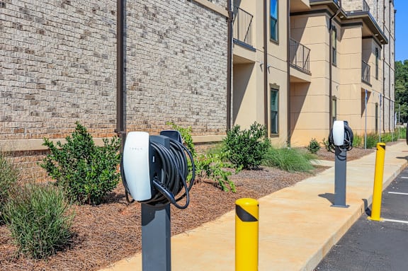a parking meter in front of a building