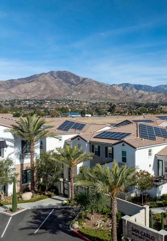 Building Exterior at San Carlo Townhomes, California, 92346