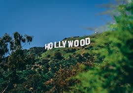 a hollywood sign on top of a hill