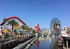 a view of a amusement park with a ferris wheel