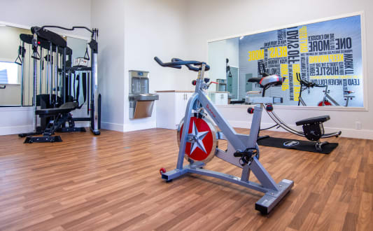 a home gym with cardio equipment and a exercise bike at Parc Medallion LLC, Union City
